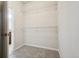 Walk-in closet with carpet floor and wire shelving for easy storage at 12201 Village Cir, Brighton, CO 80603