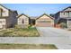 Charming single Gathering home boasts low maintenance landscaping and a two car attached garage at 12201 Village Cir, Brighton, CO 80603