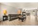 Spacious living room featuring a fireplace and hardwood floors at 21621 Stoll Pl, Denver, CO 80249