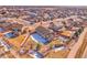 Aerial view of a house and surrounding neighborhood in a residential area at 77 N Irvington St, Aurora, CO 80018