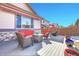 Spacious backyard deck with patio furniture and umbrella at 77 N Irvington St, Aurora, CO 80018