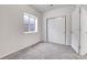 Simple and bright basement bedroom with window and closet at 77 N Irvington St, Aurora, CO 80018