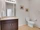 Simple bathroom with toilet and vanity at 77 N Irvington St, Aurora, CO 80018