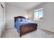 Cozy bedroom with window and neutral color scheme at 77 N Irvington St, Aurora, CO 80018