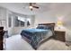 Main bedroom with bay window and neutral decor at 77 N Irvington St, Aurora, CO 80018