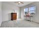 Bright bedroom featuring wood dresser and carpet flooring at 77 N Irvington St, Aurora, CO 80018