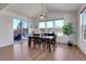 Bright dining room with hardwood floors and access to backyard at 77 N Irvington St, Aurora, CO 80018