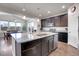 Eat-in kitchen with island and stainless steel appliances at 77 N Irvington St, Aurora, CO 80018