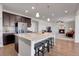 Modern kitchen with large island and stainless steel appliances at 77 N Irvington St, Aurora, CO 80018