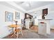 Charming dining area adjacent to kitchen with unique decor and inviting atmosphere at 13393 E Asbury Dr # 103, Aurora, CO 80014