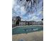 Community pool covered for the winter, located near residential building at 13393 E Asbury Dr # 103, Aurora, CO 80014