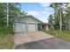 Charming ranch home with attached two-car garage and well-kept landscaping at 8427 S Custer Ln, Evergreen, CO 80439