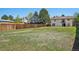 A spacious fenced backyard provides a private outdoor living area at 831 Sable Blvd, Aurora, CO 80011
