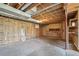 Unfinished basement with exposed insulation and ductwork, ready to be renovated at 831 Sable Blvd, Aurora, CO 80011