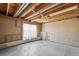 Unfinished basement with a window offers natural light and customization possibilities at 831 Sable Blvd, Aurora, CO 80011