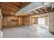 Unfinished basement with exposed ductwork, ready to be renovated at 831 Sable Blvd, Aurora, CO 80011