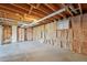 Unfinished basement with exposed insulation and ductwork, ready to be renovated at 831 Sable Blvd, Aurora, CO 80011