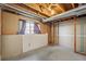 Unfinished basement with a window provides potential for a personalized living space at 831 Sable Blvd, Aurora, CO 80011