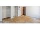 Bedroom with a closet and damaged floor, ready for remodeling at 831 Sable Blvd, Aurora, CO 80011