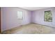 A bedroom with bare floors and two windows providing natural light at 831 Sable Blvd, Aurora, CO 80011