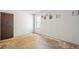 Bedroom with a window and damaged flooring, ready for renovation at 831 Sable Blvd, Aurora, CO 80011