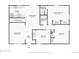 First floor plan featuring a kitchen, living room, dining room, and bedrooms at 831 Sable Blvd, Aurora, CO 80011