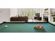 Basement game room area with a pool table, and a sofa in the background at 5575 Jackpine Rd, Evergreen, CO 80439