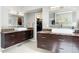 Double vanity bathroom with contemporary faucets, undermount sinks, and plenty of storage at 5575 Jackpine Rd, Evergreen, CO 80439