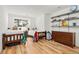 Cozy bedroom with two beds, built-in shelves and wood floors at 5575 Jackpine Rd, Evergreen, CO 80439