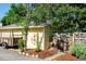 View of back of yellow house with trailer parked on street and gated backyard at 310 Judson St, Longmont, CO 80501
