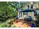 Relax on the back deck with a dining set and enjoy the beautifully landscaped yard at 310 Judson St, Longmont, CO 80501