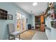 Light-filled bonus room with a skylight, wood flooring, a sauna, and access to the backyard at 310 Judson St, Longmont, CO 80501