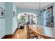 Charming dining room with vintage chandelier and open access to the living spaces at 310 Judson St, Longmont, CO 80501