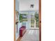 Bright entryway with natural light, storage bench, and view of the outdoors at 310 Judson St, Longmont, CO 80501