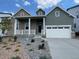 Charming two-story home featuring a covered porch and a two-car garage at 3394 Backdrop Ct, Castle Rock, CO 80108