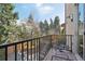 Private balcony with comfortable seating and views of the serene backyard landscape at 350 15Th St, Boulder, CO 80302