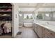 Luxurious bathroom with a soaking tub, dual vanities, and a walk-in shower at 350 15Th St, Boulder, CO 80302