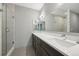 Contemporary bathroom featuring a double vanity, modern fixtures, and a glass-enclosed shower at 350 15Th St, Boulder, CO 80302