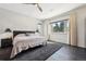 Spacious bedroom with a plush bed, modern furnishings, and large windows with scenic views at 350 15Th St, Boulder, CO 80302