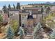 Stunning modern home showcasing stone accents, large windows, and professional landscaping in a natural setting at 350 15Th St, Boulder, CO 80302