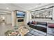 Inviting living room with stone fireplace, large window with nature views, and modern decor at 350 15Th St, Boulder, CO 80302