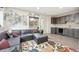 Modern living room with a stylish wet bar, comfortable seating, and unique wall decor at 350 15Th St, Boulder, CO 80302