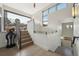 Bright staircase with large windows, modern railings, and hardwood floors creates an open feel at 350 15Th St, Boulder, CO 80302