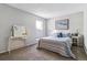 Serene bedroom with neutral tones, plush carpeting, and a comfortably sized bed, creating a relaxing atmosphere at 6650 E Arizona Ave # 154, Denver, CO 80224