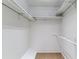 Bright, walk-in closet with ample storage space with shelving and racks at 6650 E Arizona Ave # 154, Denver, CO 80224