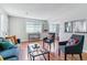 Inviting living room with stylish furnishings, hardwood floors, and plenty of natural light at 6650 E Arizona Ave # 154, Denver, CO 80224