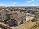 Aerial view of a two-story home with a lovely patio in a sprawling suburban neighborhood at 24269 E Arapahoe Pl, Aurora, CO 80016