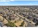 An aerial view showcases a sprawling neighborhood, offering a sense of community and vastness at 24269 E Arapahoe Pl, Aurora, CO 80016