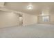 Spacious carpeted basement with recessed lighting, and views of stairs leading to the upper level at 24269 E Arapahoe Pl, Aurora, CO 80016