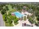 Aerial shot of a community pool with lush greenery, lounging areas, and Gathering-friendly amenities at 24269 E Arapahoe Pl, Aurora, CO 80016